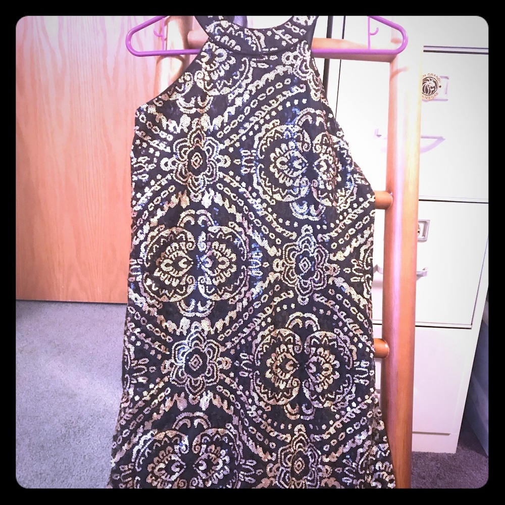 Black and gold sparkly dress.